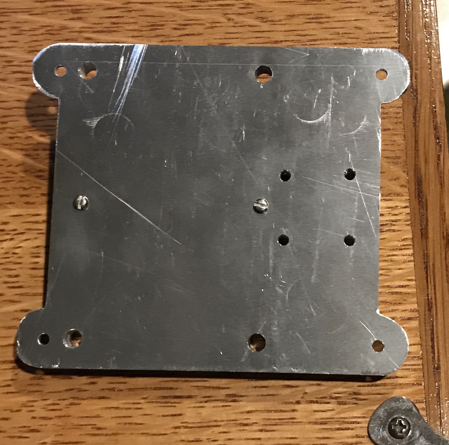 Overcrank engine sub-base drilled